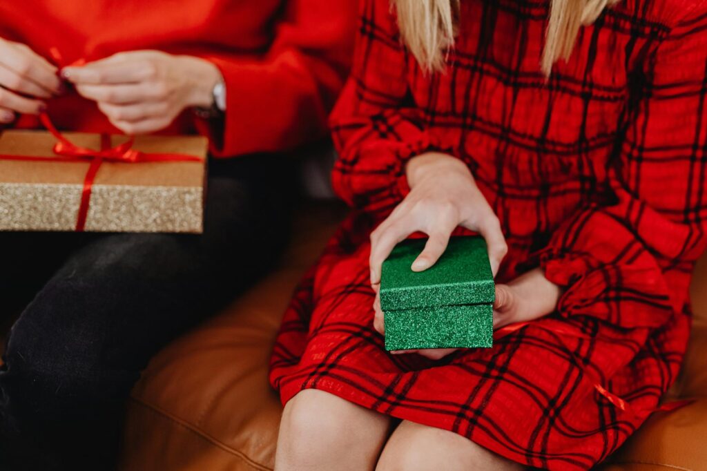 Veteran family exchanging patriotic holiday gifts