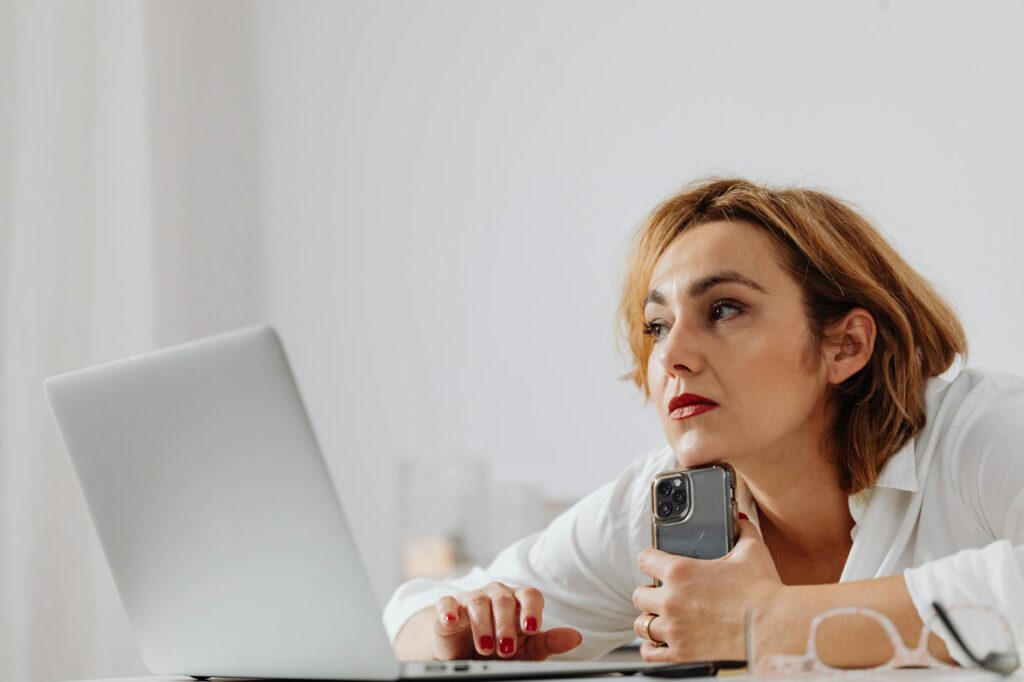 Veteran wearing patriotic long sleeve shirt with folded American flag